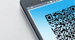 Part of a phone screen displaying a QR code