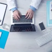 doctor working on laptop