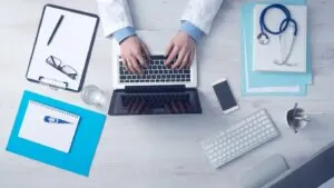 doctor working on laptop