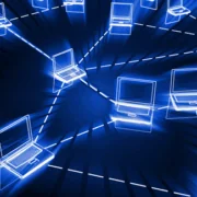 Laptops connected, dark background