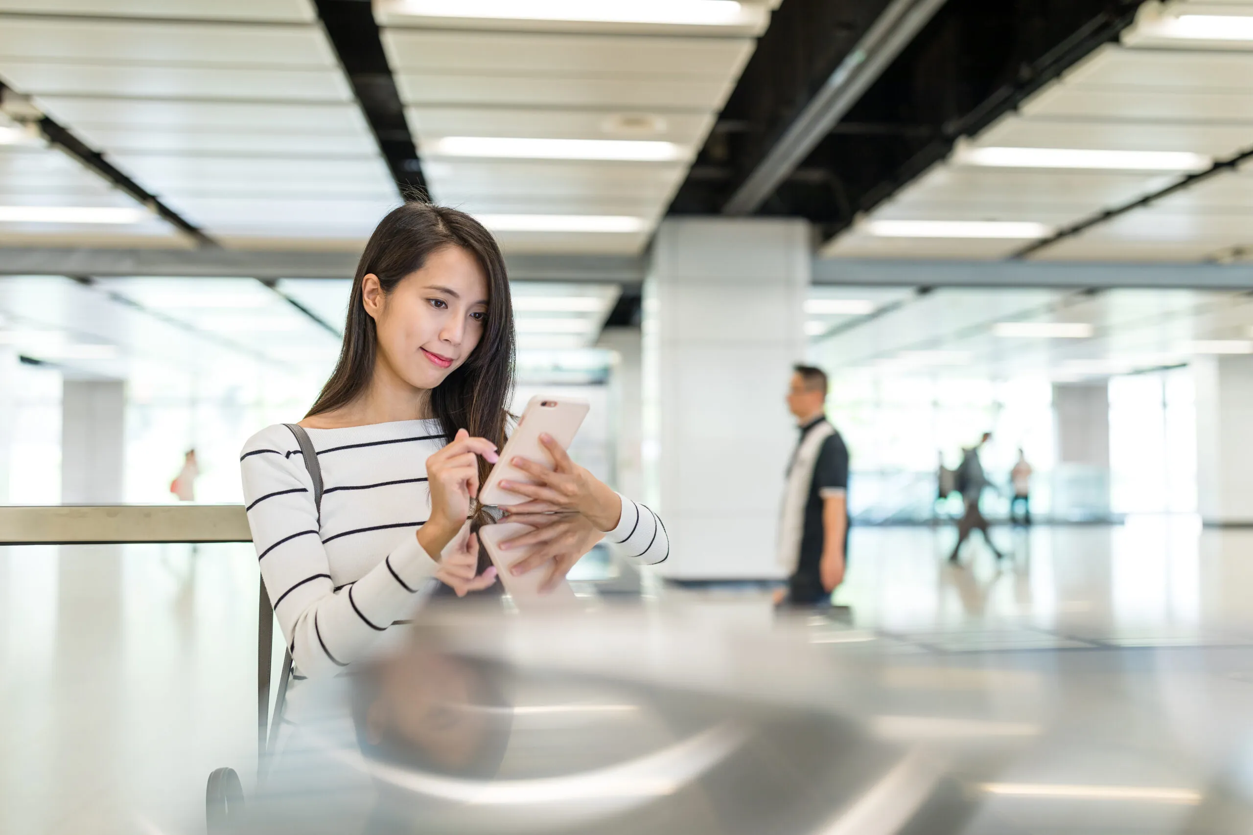 Young Woman use of mobile phone