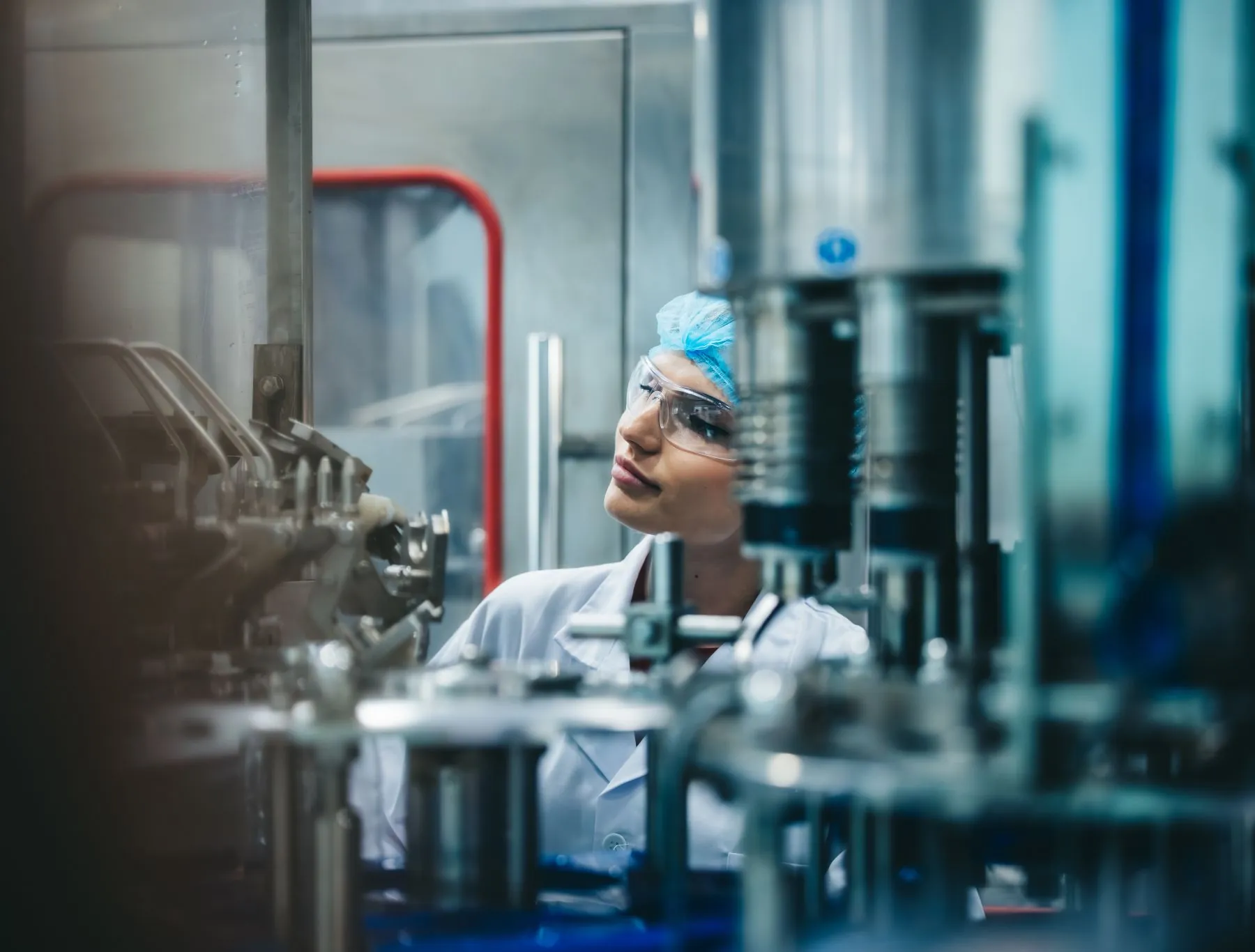 supervisors check automated bottling for sequence
